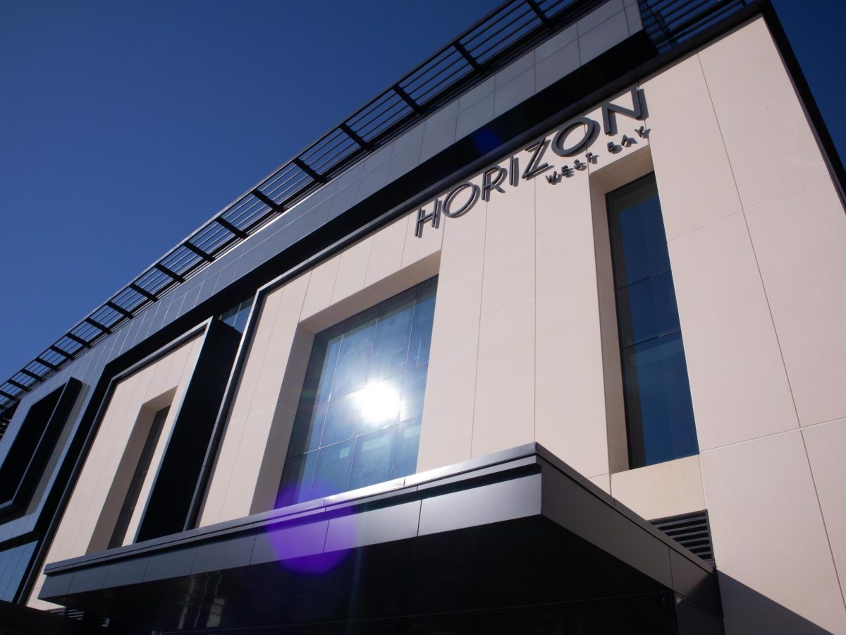 Horizon West Bay houses the new City Hall, City Commission Chamber, and retail space for businesses like Parlor Doughnuts.